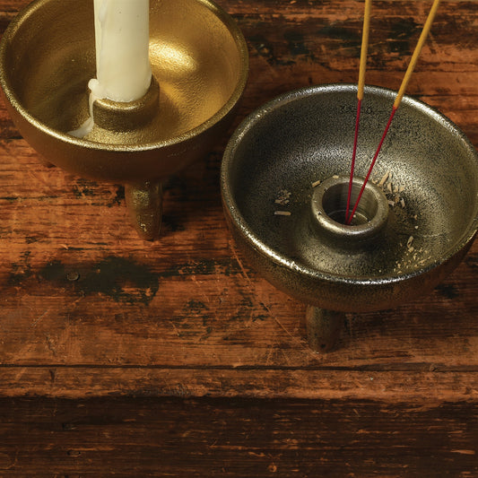 Pair of incense or taper holder in antique brass and nickel on distressed wood