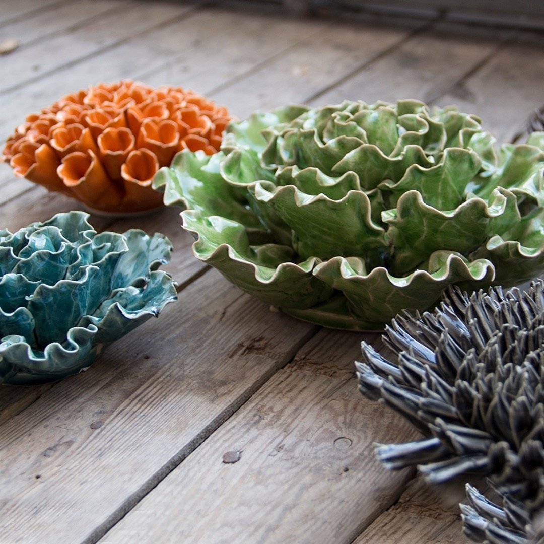 Collection of ceramic succulents and flowers in an assortment of colors