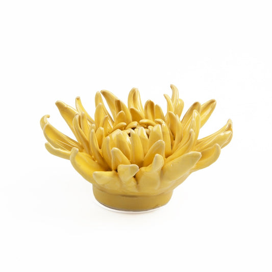 Ceramic yellow mum flower, side view.