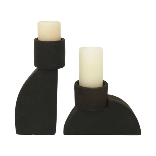 Torino pillar candle holders in matte black terracotta, tall and short, each holding a cream pillar