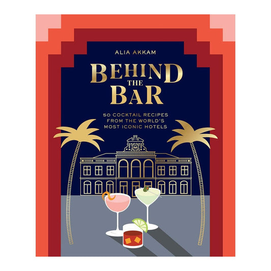 Behind the Bar book cover, navy with a gold hotel facade, palm trees and three cocktails in a red stepped arch
