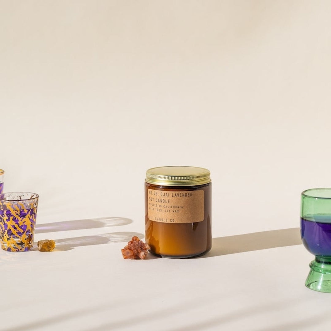 No. 35 Ojai Lavender Soy candle in amber jar with craft label and brass lid.