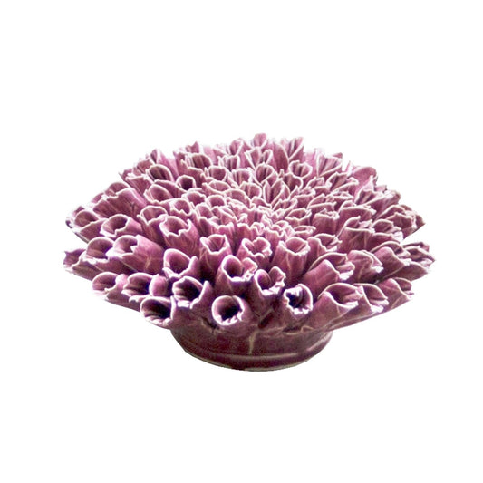 Ceramic anemone in purple, side view.