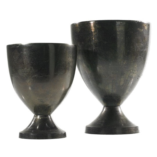 Set of dark metal urns