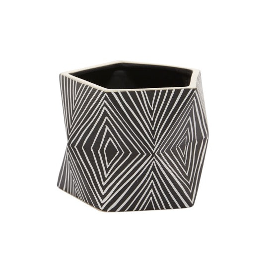 Abstract pot with linear designs in black and white