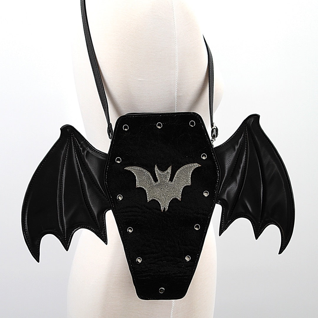 Bat coffin backpack in black vinyl.