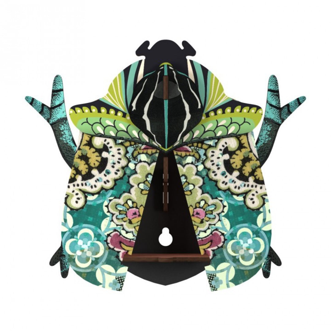 Bill beetle wall cabinet, wings open with storage inside, collage of green, blue, magenta patterns