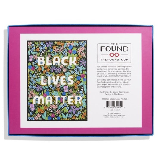 Black Lives Matter puzzle with colorful wildflowers pattern. 