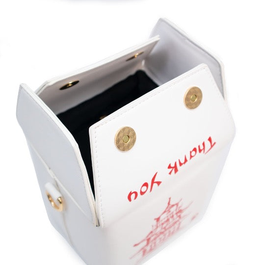 Chinese takeout box novelty handbag with leather strap.