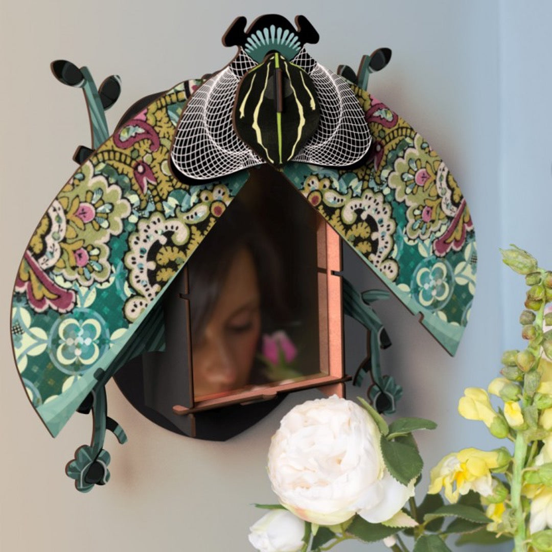 Charlie beetle mirror wall cabinet, wings open with mirror inside,mint green, purple and black patterns