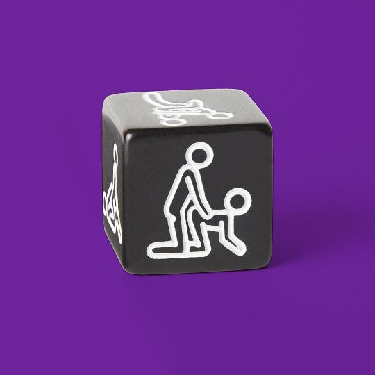 black dice on purple background