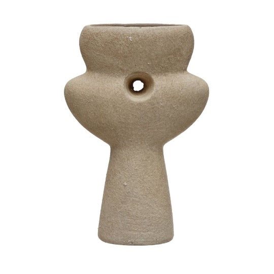 sculptural vase in natural sand color.  Small hole in center