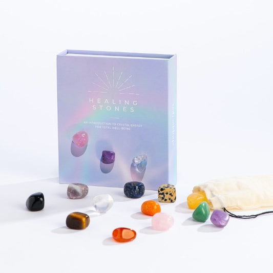 Purple box with a variety of healing stones.