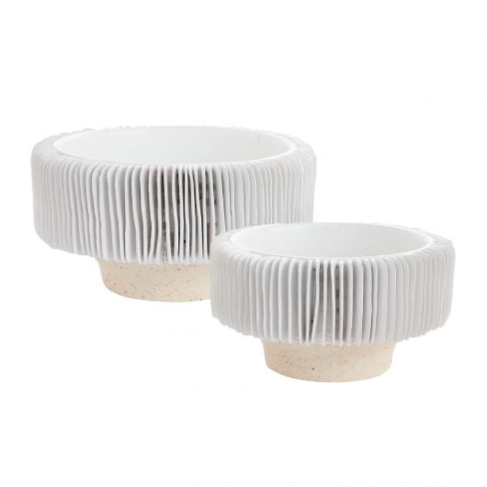 Set of white ceramic compotes with thin slices pattern