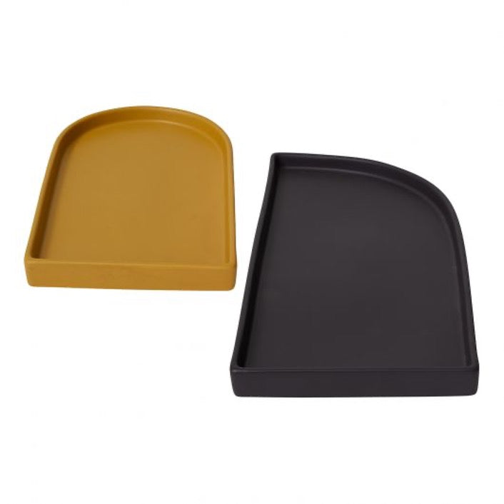 Set of ceramic trays. Arched tray in mustard and semi-arched tray in black.