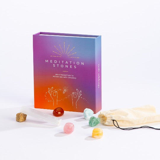 Multi-colored box with a variety of meditation stones.