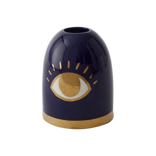 Candlestick holder in blue with eye in gold accents.