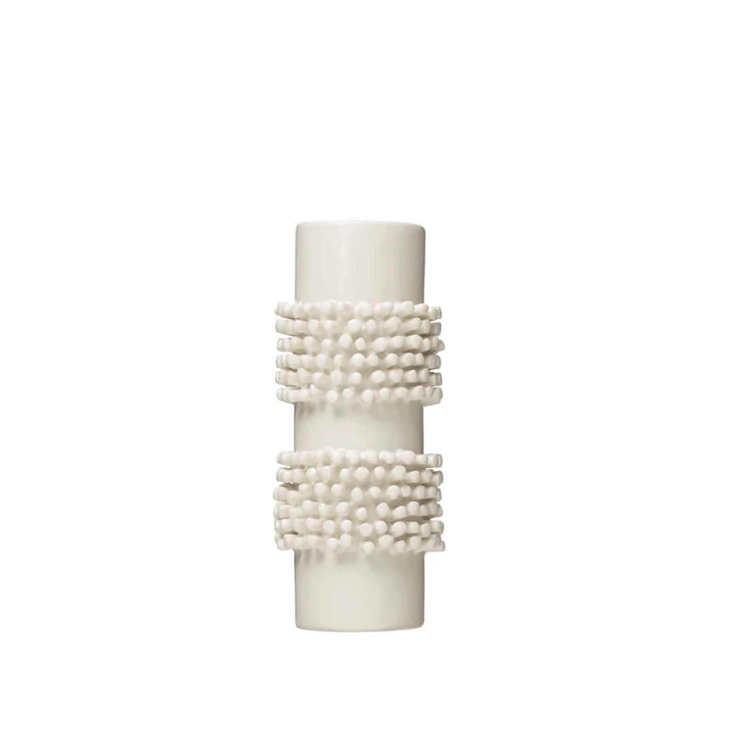 Modern white vase featuring 2 stripes of thick bubbles.  