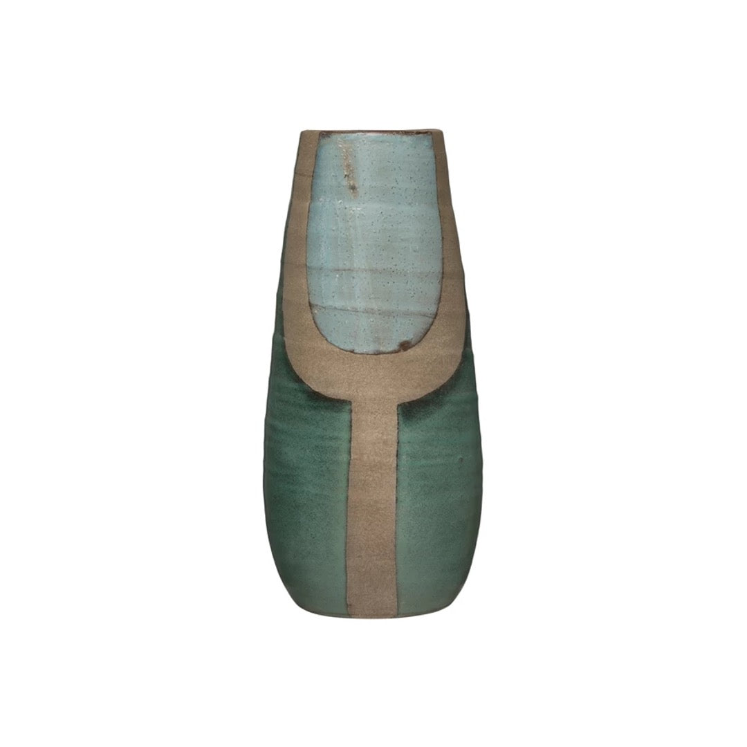 Abstract terracotta vase hand-painted in turquoise and blue tones. 