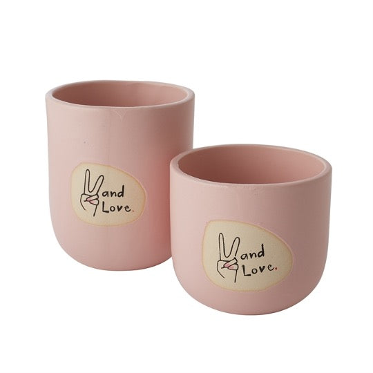 Pair of pink pots with peace hand with text - and love. 