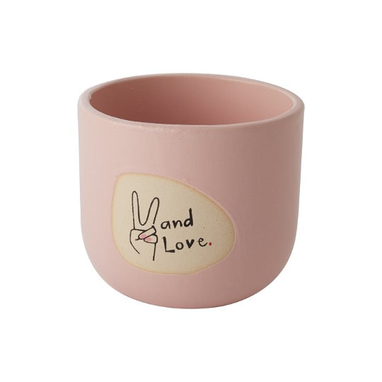 Pink pot with peace hand with text - and love. 