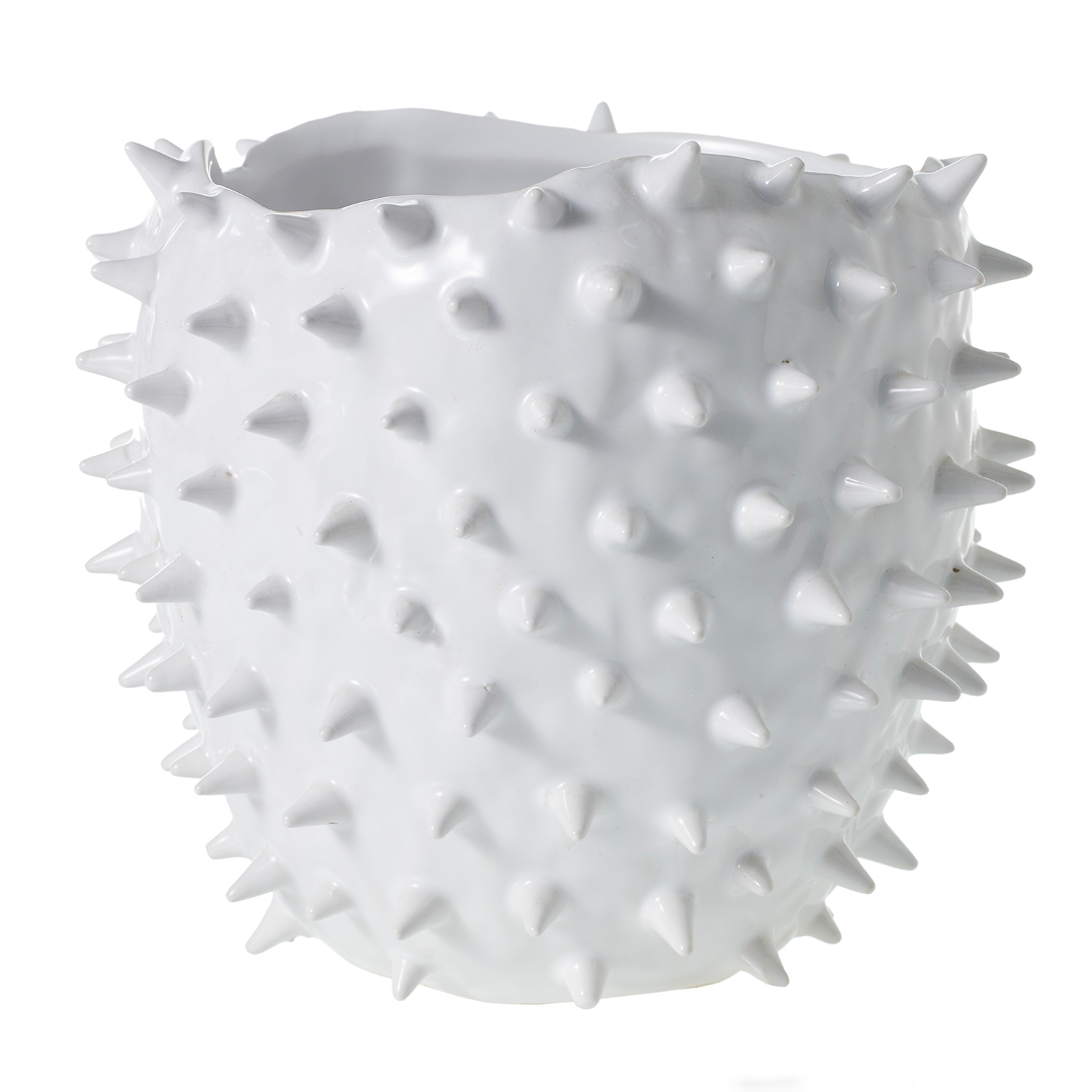 Glossy white ceramic pot with spikes