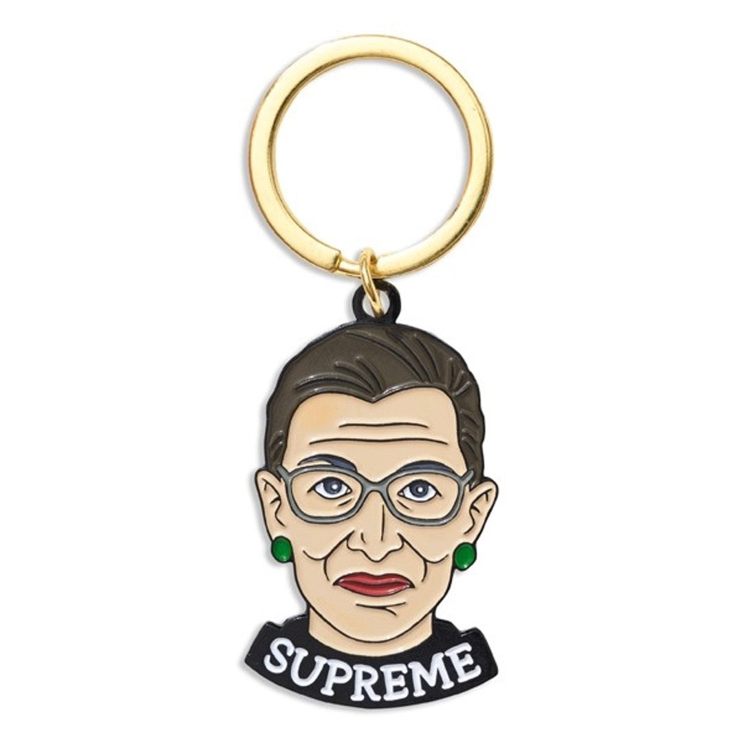 Ruth Bader Ginsburg with the text Supreme written around collar.  Brass key ring