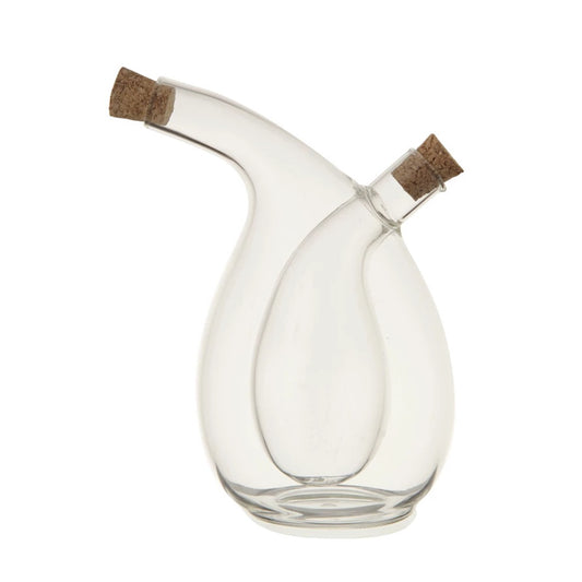 Clear glass oil and vinegar cruet with cork stoppers. 