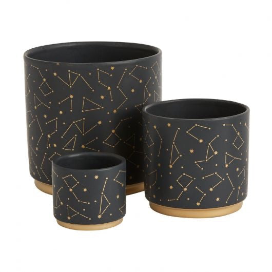 Set of 3 black pots with star constellation in gold.
